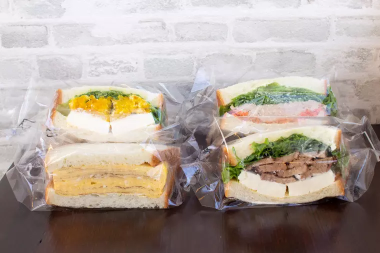 ▲(左上から時計回りで)「かぼちゃサンド」「ツナサンド」「照り焼きチーズサンド」「厚焼きたまごサンド」